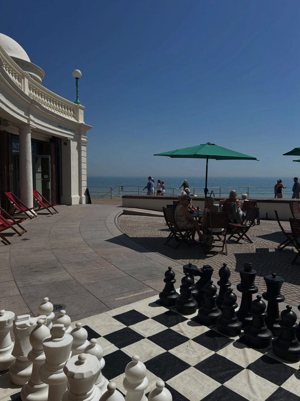 Outdoor seating and giant chess at the Colonnade